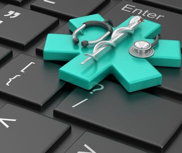 healthcare symbol on computer keyboard