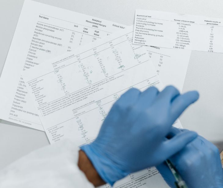 medical gloves and paperwork