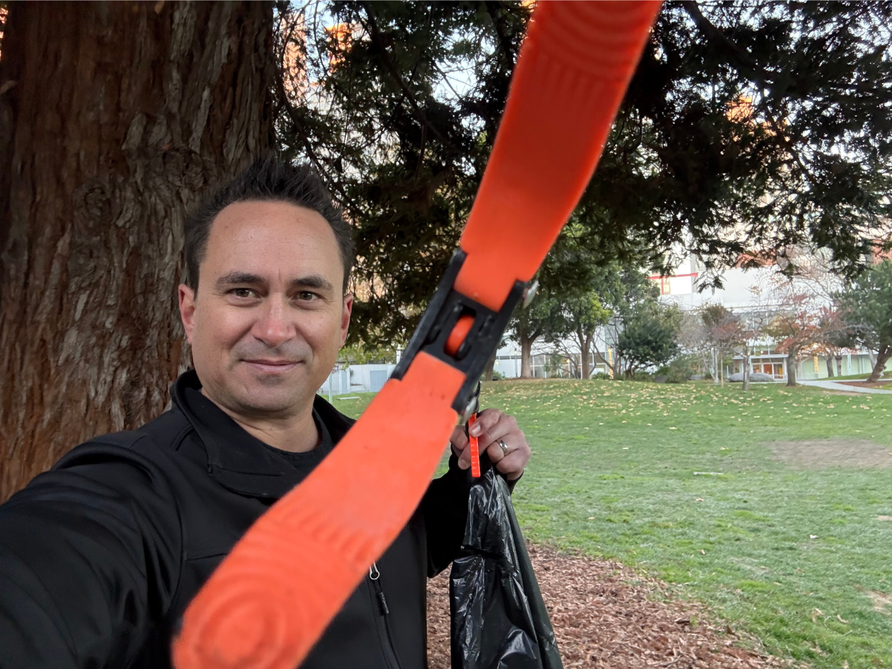Hoala Greevy with the claw | Cleaning up Yerba Buena Gardens - Paubox Community Service