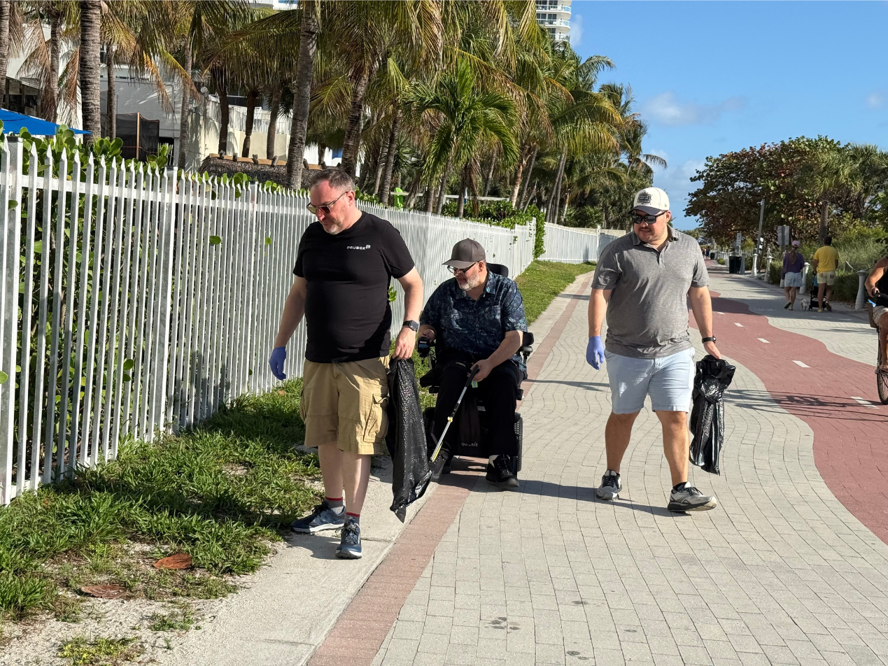 Left to right: Robert Ogus, Dan Dorszynski, and Milton Andrade scanning the Boardwalk for things like cigarette butts.&nbsp;
