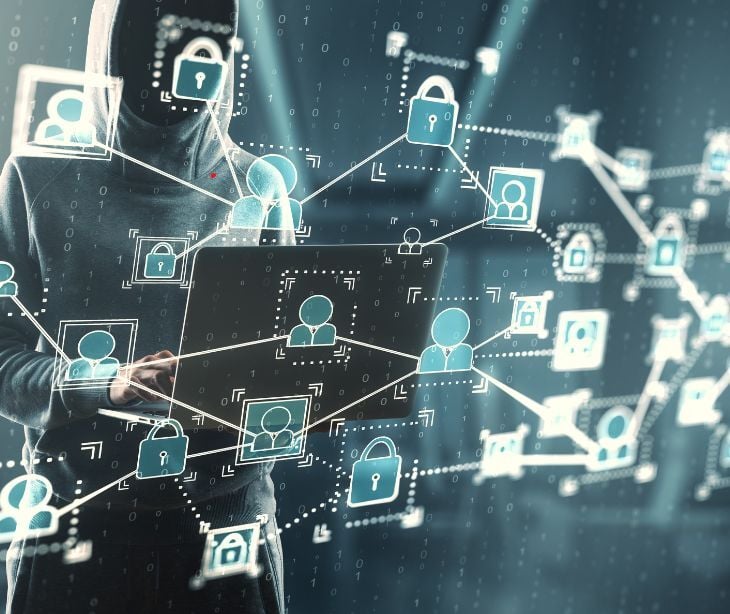 hacker with floating security icons