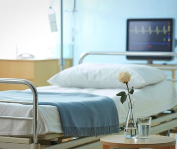 Image of a hospital bed. 