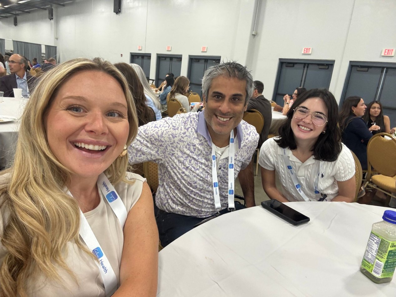 Kenzie Mills of Paubox taking a selfie with two members of the Josi Health team at a lunch table at BHT2026 | Paubox at Behavioral Health Tech 2026 in Nashville