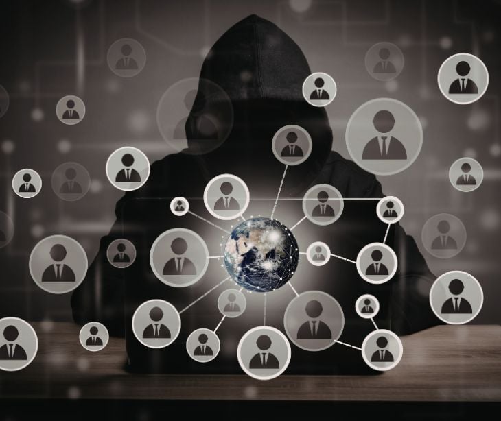 hacker surrounded by people icons