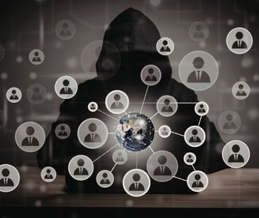 hacker surrounded by people icons