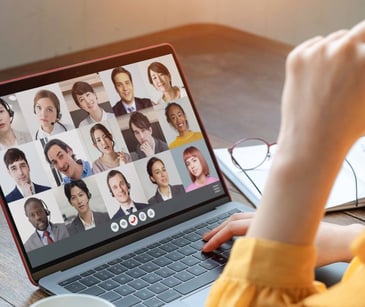 computer screen with multiple people on a video call