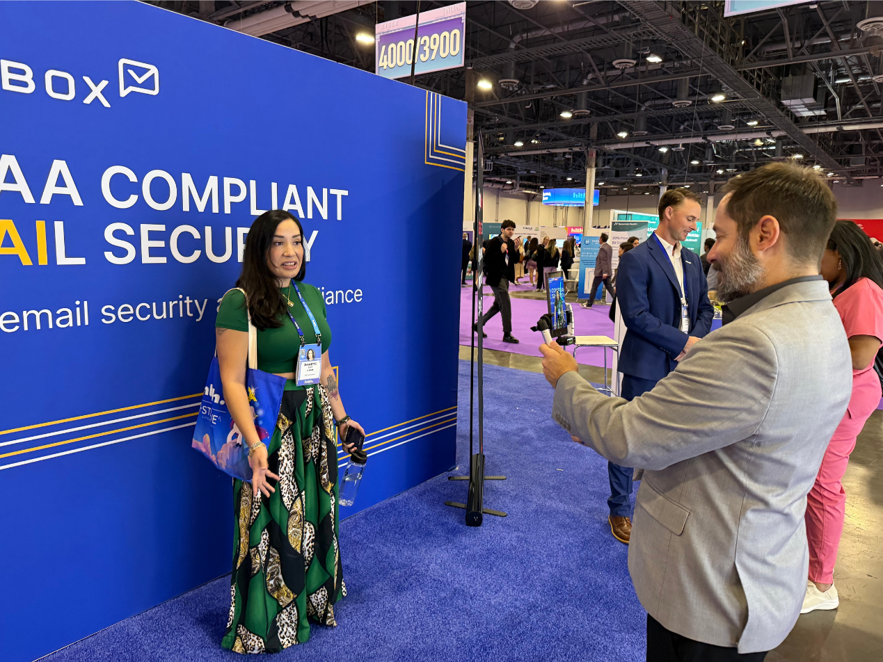 Dean Levitt filming a customer testimonial with Jeanette Lira (Auravia Holistic Therapy) | HLTH USA 2025 Day 1: My Takeaways