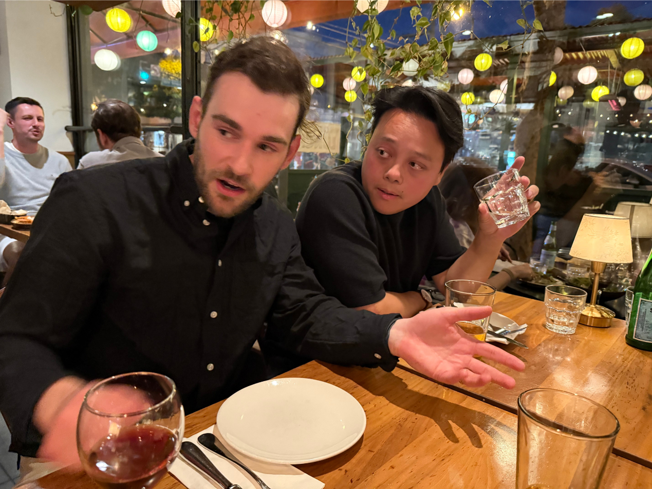 Tyler Brown (left) and Justin Ith swap stories about the peaks and valleys of running a startup. | Health Tech Founders Dinner in SF