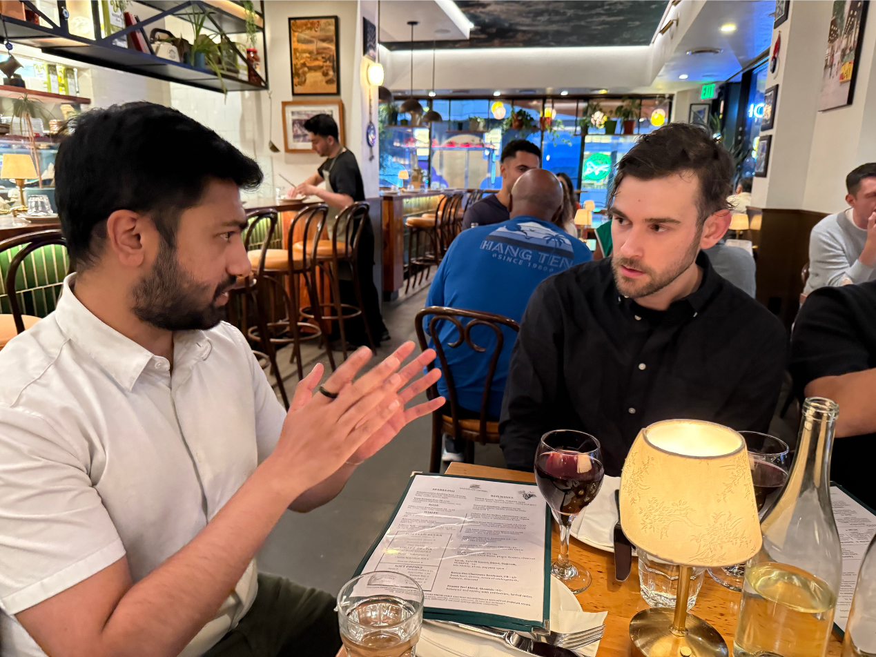 Soham More (left) sharing his thoughts on Founder-led selling with Tyler Brown | Health Tech Founders Dinner in SF