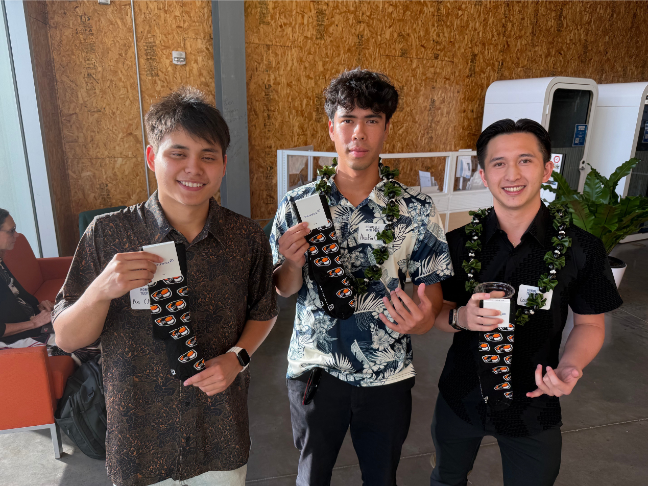 Paubox Kahikina Scholarship panelists with the flying spam musubi Pausox: Koa Chang, Austin Cataluna, and Logan Lau | Honolulu Tech Week 2025: Paubox Kahikina Scholarship Panel