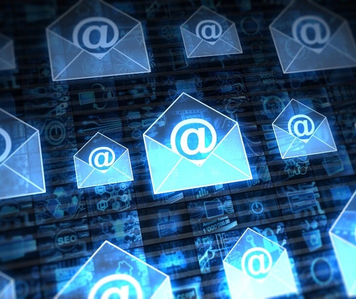 Image of envelopes with at signs in them. 