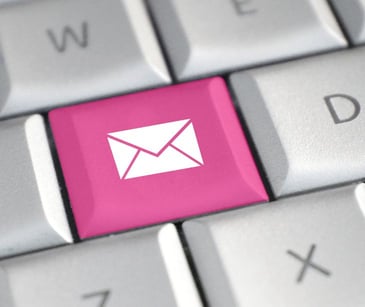 keyboard with pink email icon