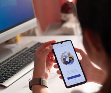 Image of someone with Microsoft 365 on their phone. 