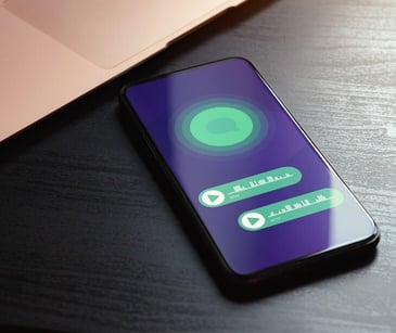 Image of a phone with a voicemail open. 