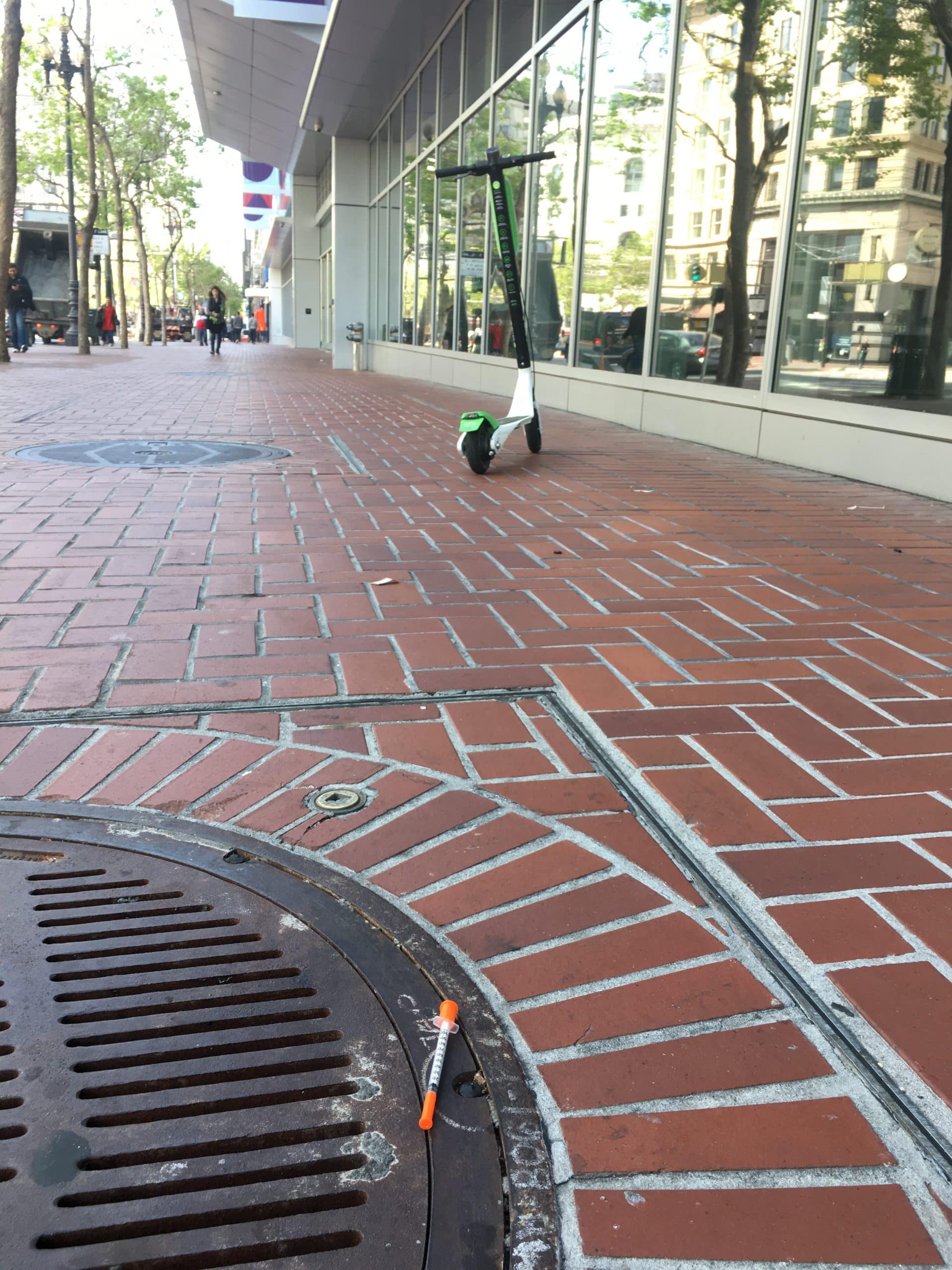 The Million Dollar Scar - Electric Scooters and Needles on Market Street