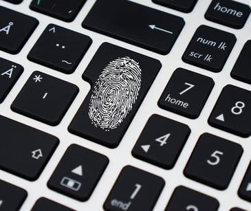 Image ofa fingerprint on a keyboard. 