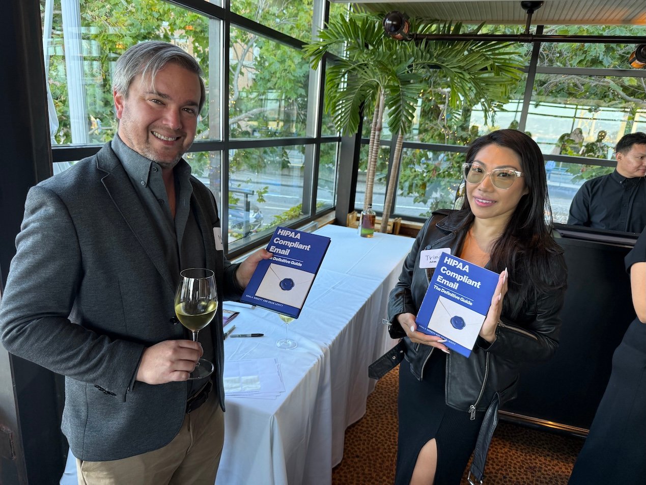 Maxwell Sindell and Trina Mui got signed copies of our new book on HIPAA compliant email | Paubox Industry Dinner in San Francisco