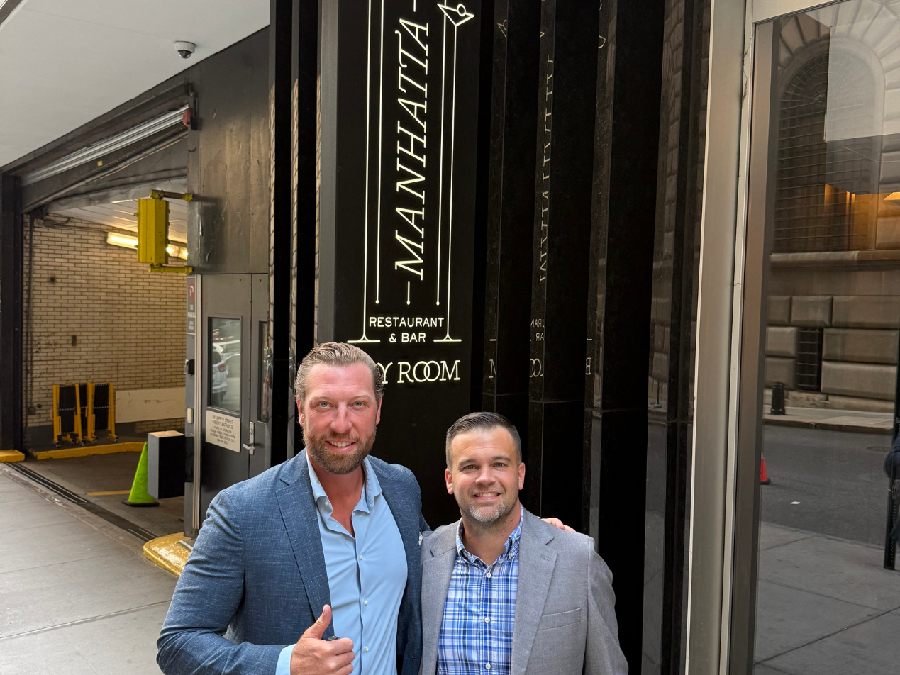 Greg "Hoff" Hoffman and Jordan Holmes, early to the event | The Paubox Table: Dinner in NYC