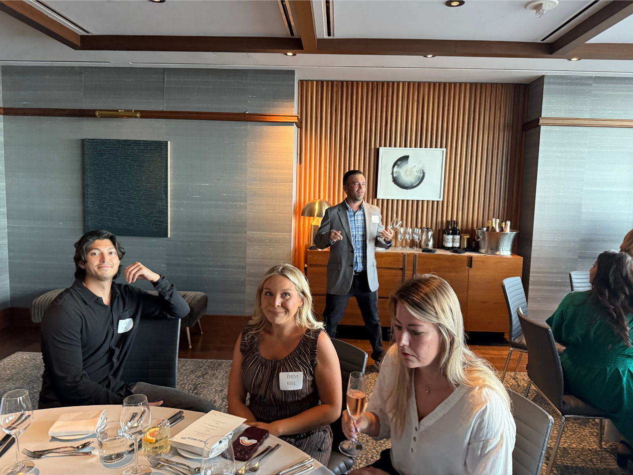 Jordan Holmes sharing some takeaways from an AI survey we compiled | The Paubox Table: Dinner in NYC