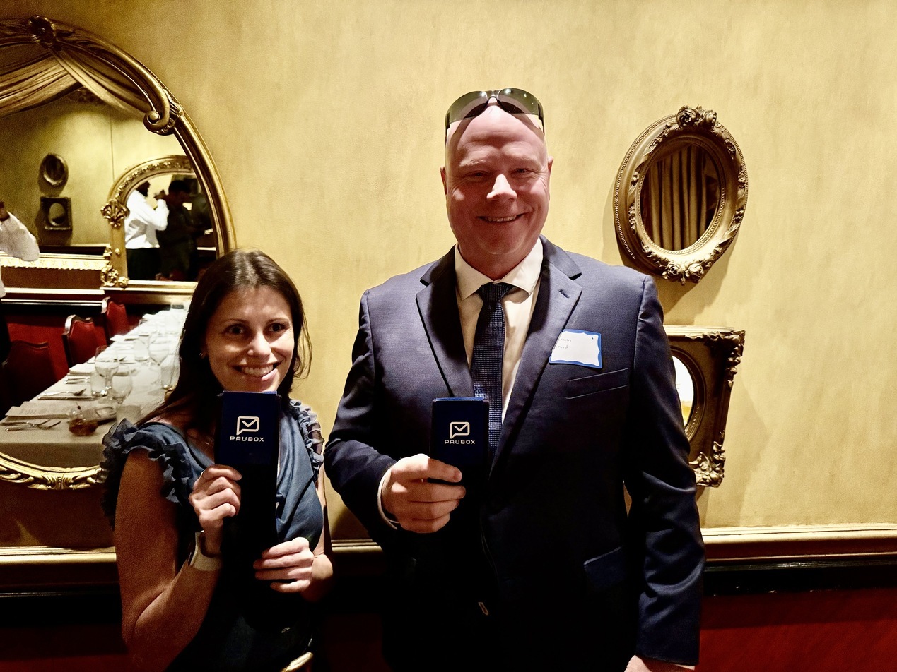 Happy Paubox customers Jennie Friedman (Jennie Friedman Counseling) and Norman Breed (ProsperInfusion), showcasing the 2026 Pausox edition | The Paubox Table: Dinner in Tampa