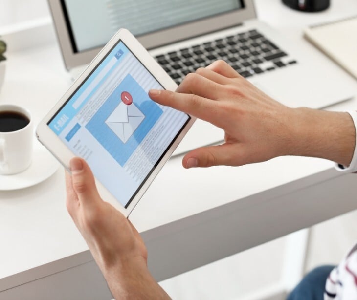 Image of someone viewing an email. 
