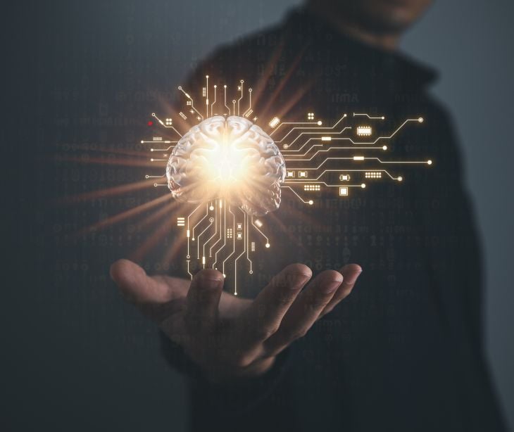 hand holding digital brain