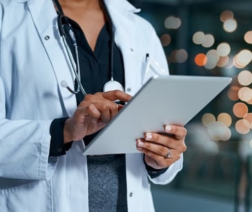 Image of a practicioner using an I-Pad. 