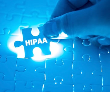 blue puzzle piece with HIPAA text