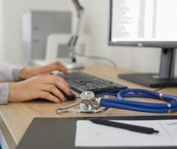 stethoscope and computer