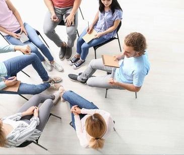 people sitting in a circle