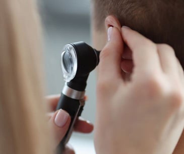 provider lookin in patient ear