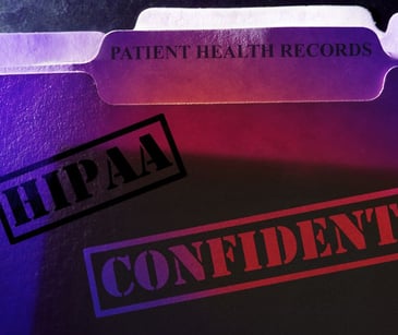 red folder that says HIPAA confidential