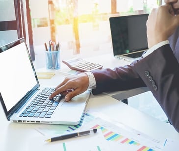 Image of someone on their computer. 