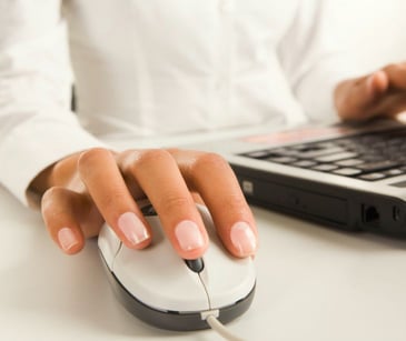 hand on a computer mouse