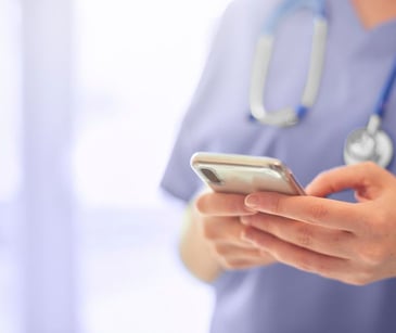healthcare provider on smartphone