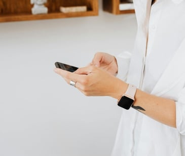 Image of someone on a phone. 