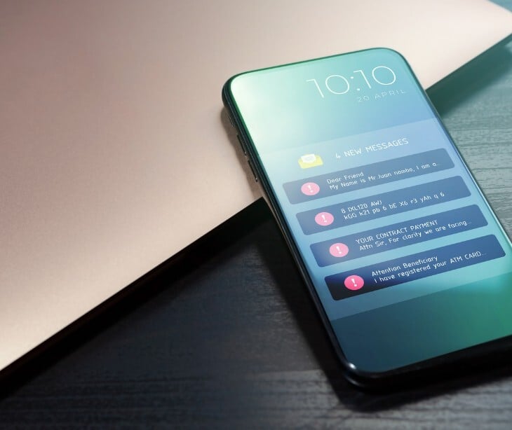 Image of a phone with spam quotes. 