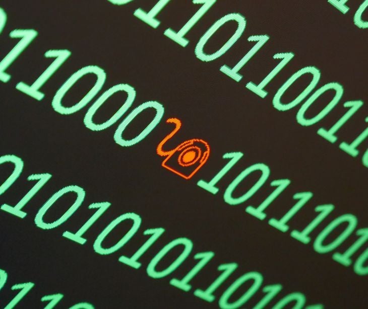 Image of code with a red icon in between numbers. 