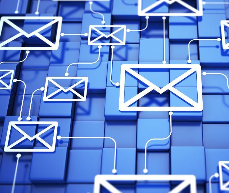 email icons on a blue digital background