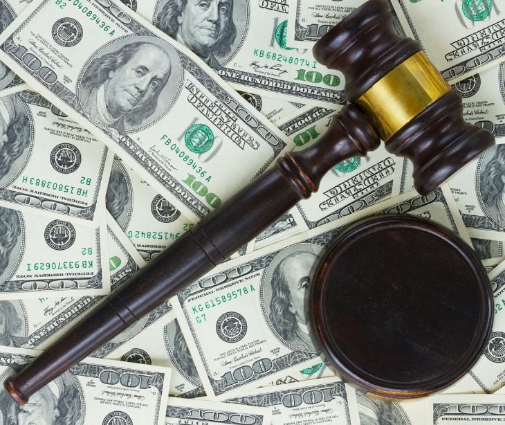 law gavel with money bills