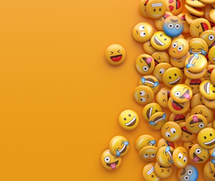 Image of emojis with a yellow background. 