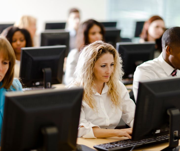 new employees in a computer lab