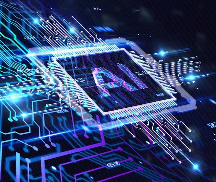 Image what looks like a computer chip that reads "AI." 