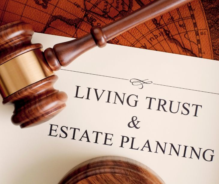 law gavel on living trust and estate planning document
