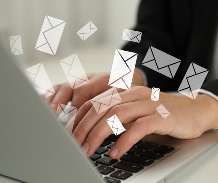email icons over laptop
