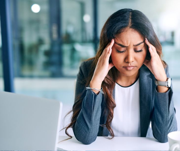 woman stressed at desk