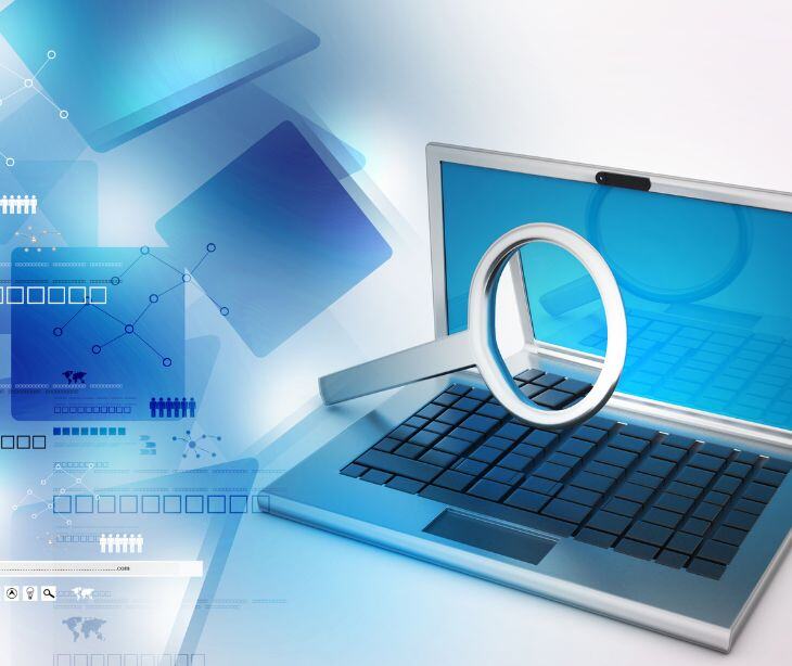 computer with magnifying glass