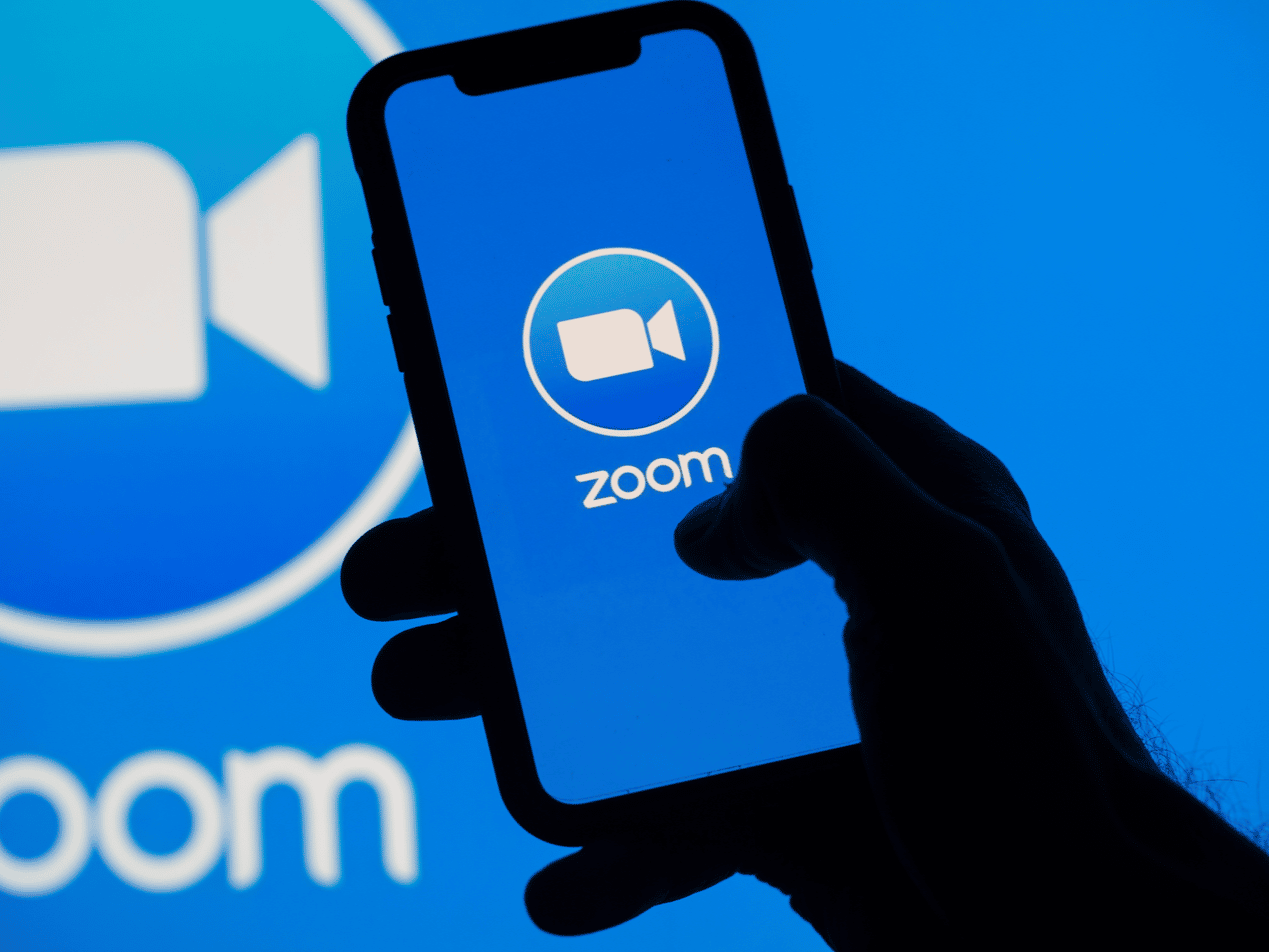 smartphone with Zoom Video Webinar on screen