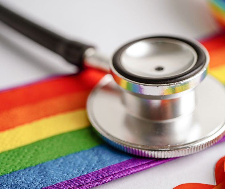 lgbtq flag with stethoscope