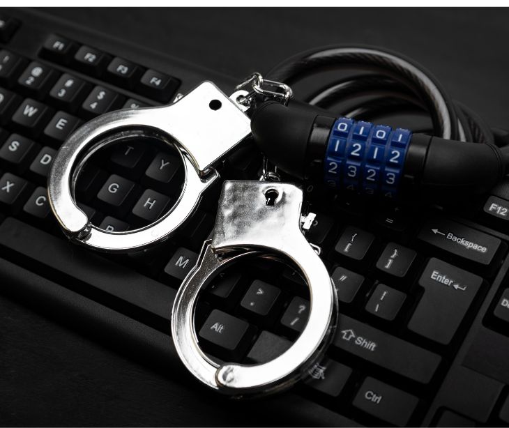 laptop with handcuffs